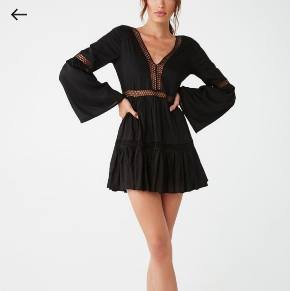 Bell sleeve, opened back, and fishnet mini dress